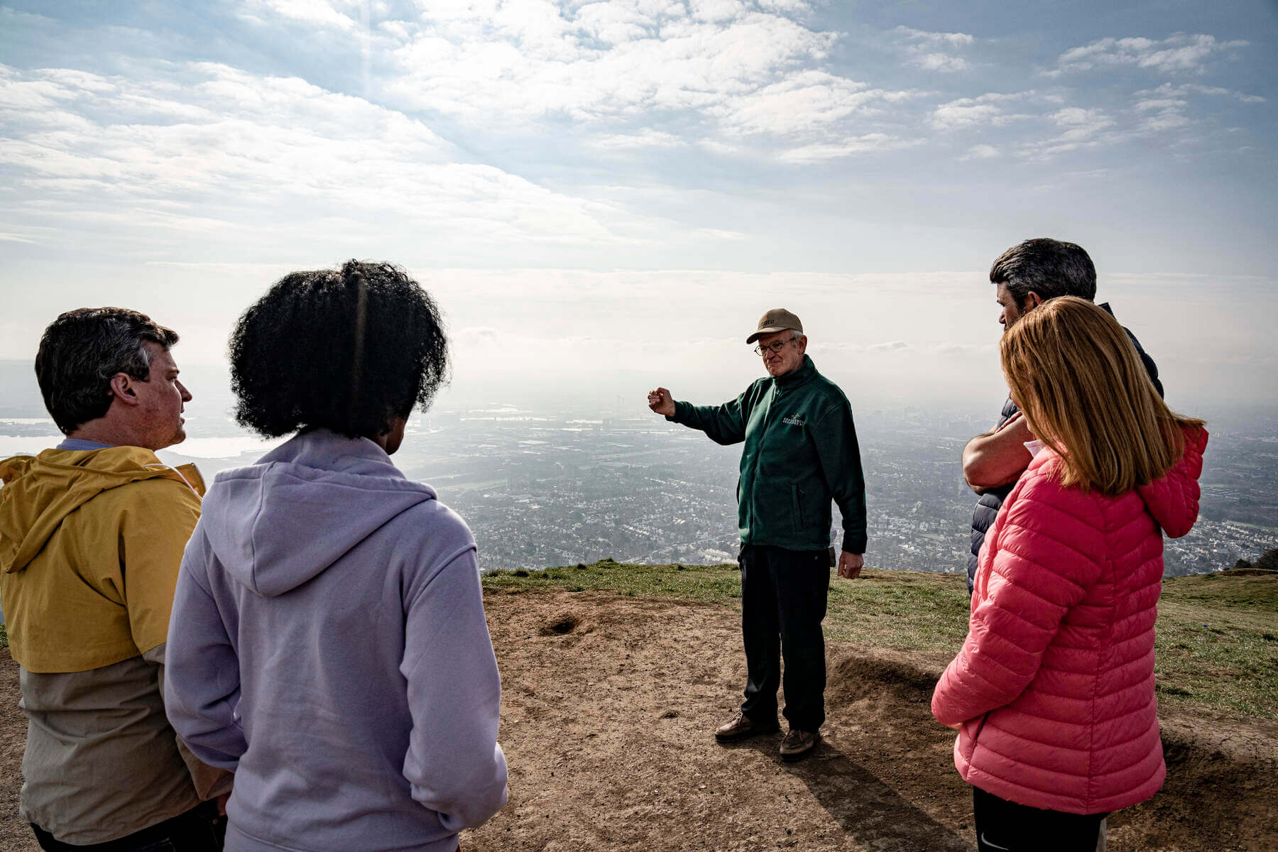 GB Tourists looking over Belfast landspace from 