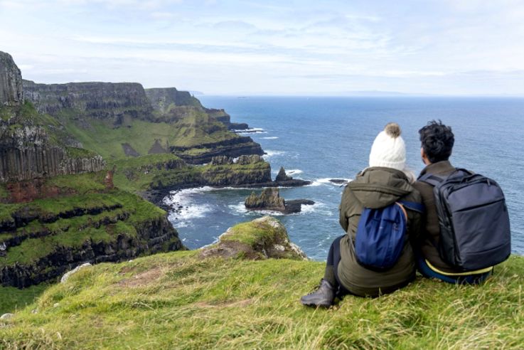 Couple enjoying scenic views of Causeway Coast as part of the Away a Wee Walk tour.