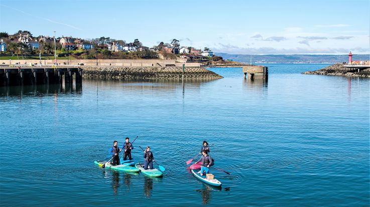 Visitors enjoying their experience at SUP Hub Bangor