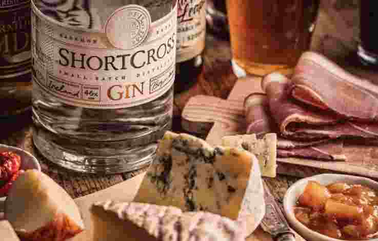 Charcuterie board made up of local cheeses and meats paired with ShortCross Gin
